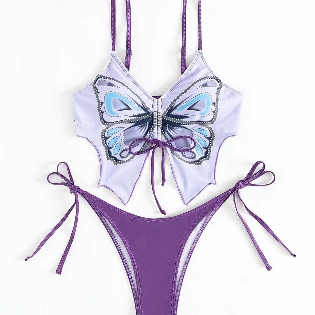 Purple women's bikini suit with a bow on the top and split-style briefs.