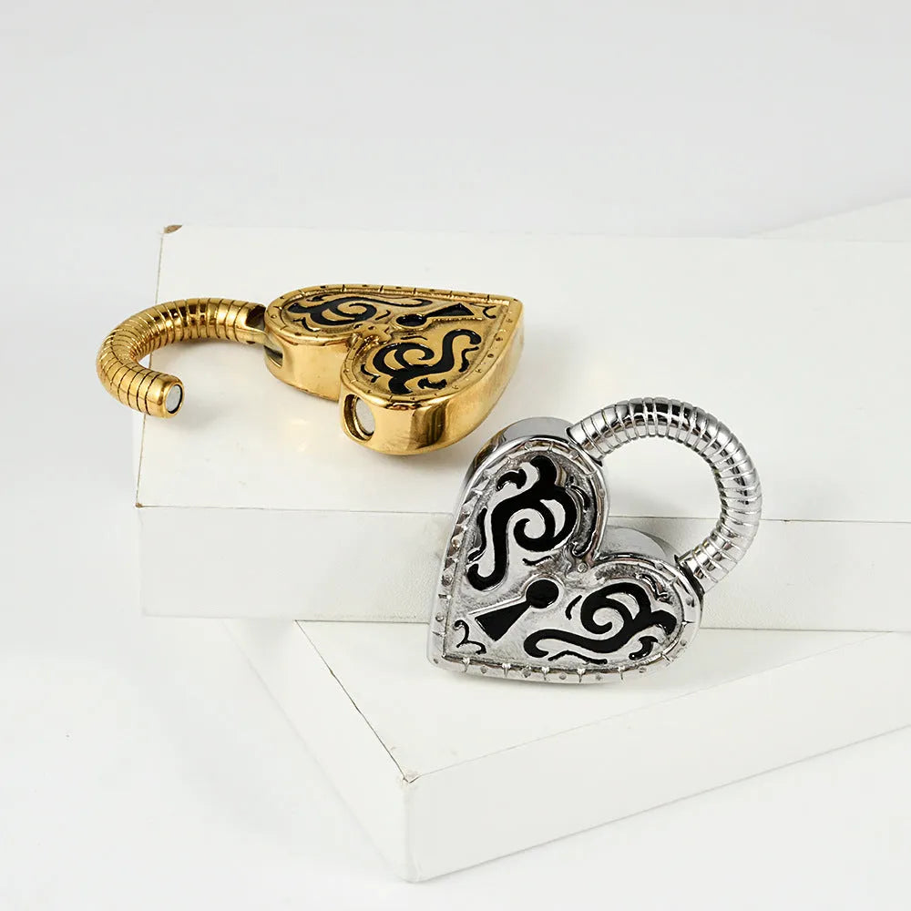 Single stainless steel heart-shaped stud earring for fresh piercings in gold colour.