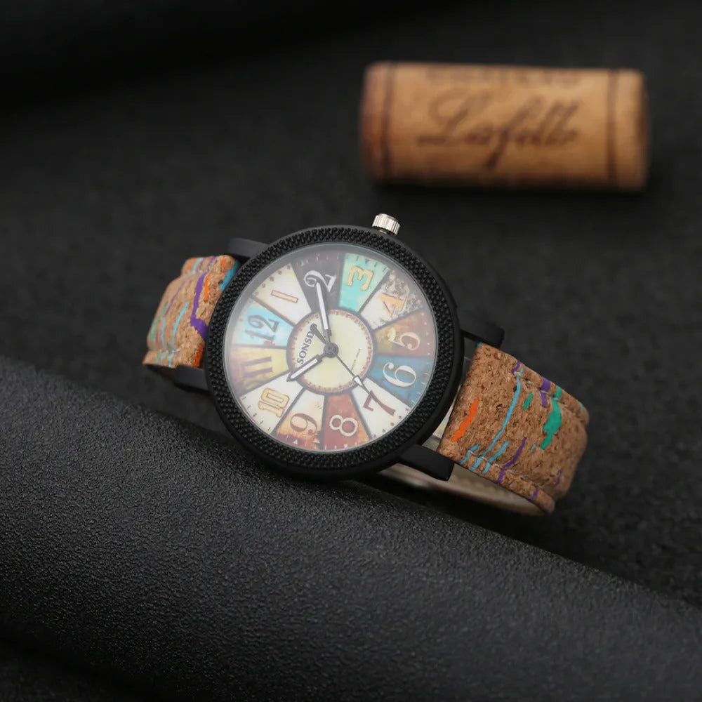 Women's leather strap quartz watch with 37mm round dial and stainless steel buckle