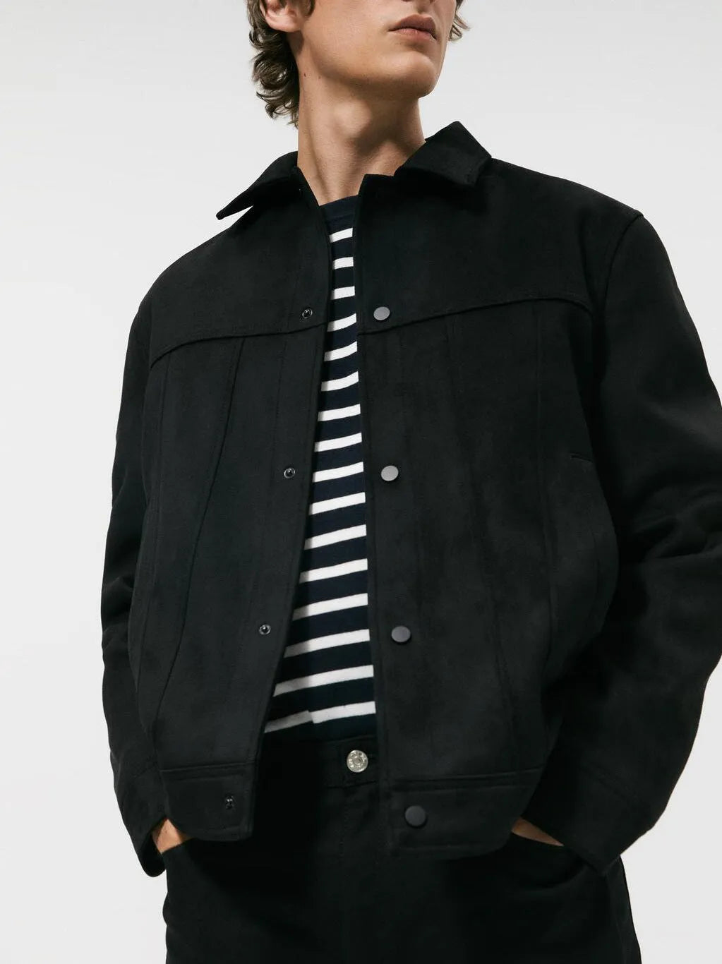 Black men's hooded jacket with a suede collar and side pockets.