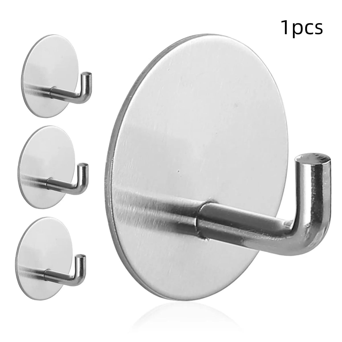 Pair of round stainless steel self-adhesive hooks, one black sanded and one polished, for bathroom or kitchen wall mounting.