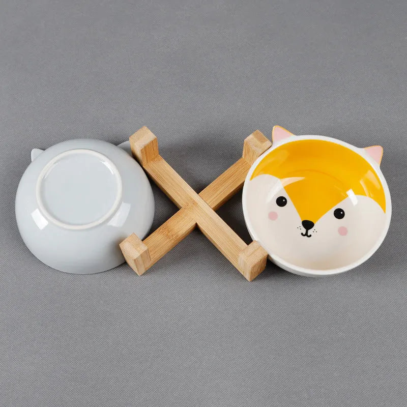 Raised ceramic cat food bowl in bamboo wooden stand, 13cm bowl, pink fox design