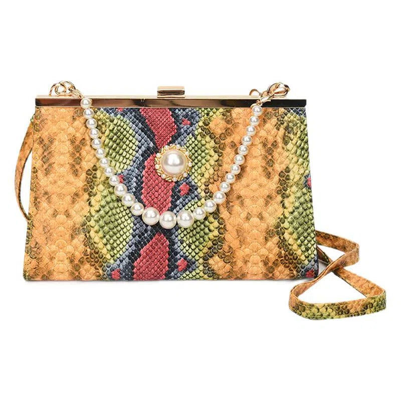 Hard PU evening bag in snake pattern with pearl-chain detail and stitching, available in six colours