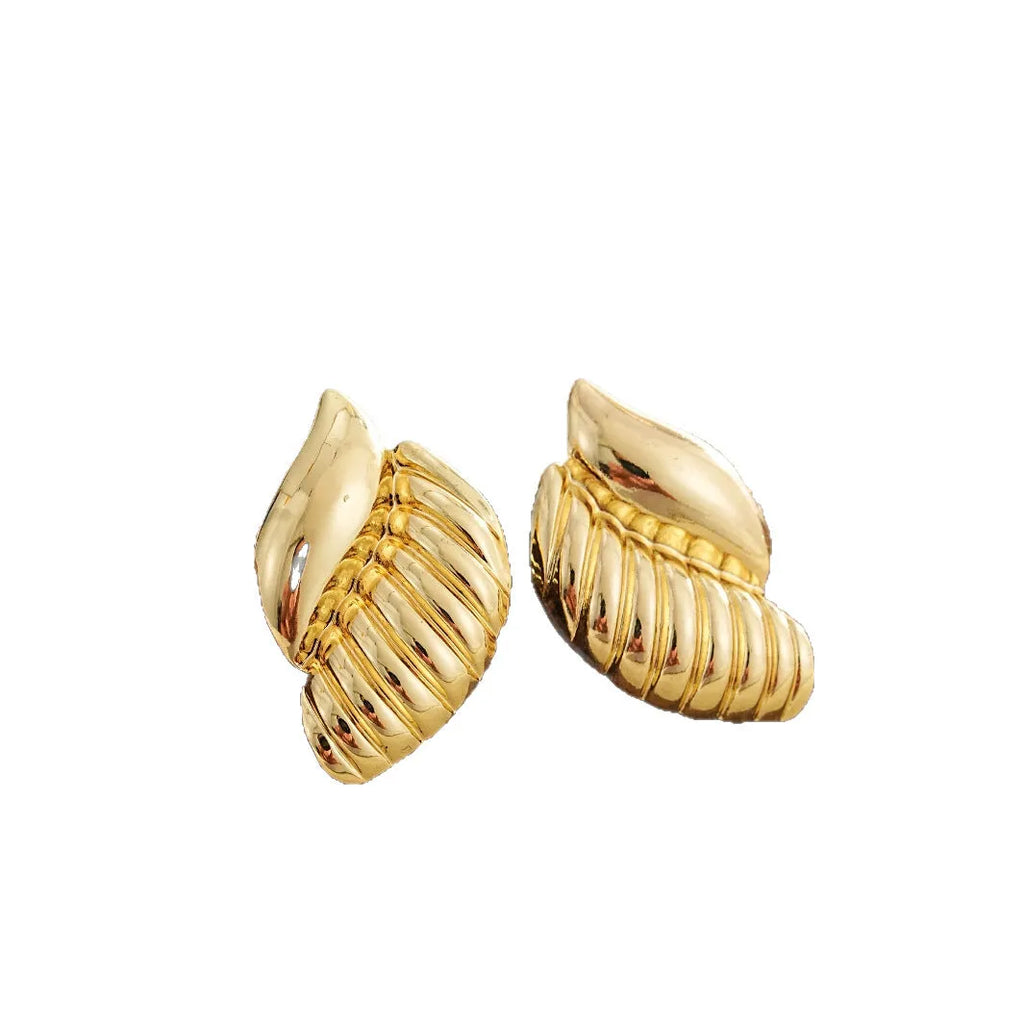 Pair of gold threaded water drop earrings for women on white background