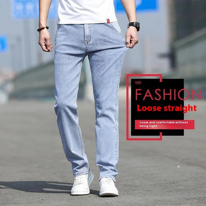 Man wearing smoky gray low-waist straight-leg jeans made from high-elasticity rabbit fur fabric.