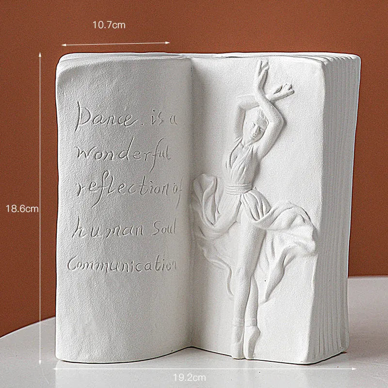 Ceramic book stand with glazed surface in one of four artistic designs: lover, dancer, beauty and beast, or brushed face