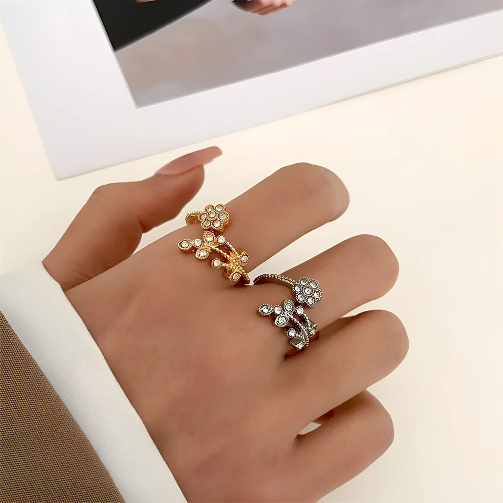 Women's copper open ring with white and gold flower leaf design and diamond style finish