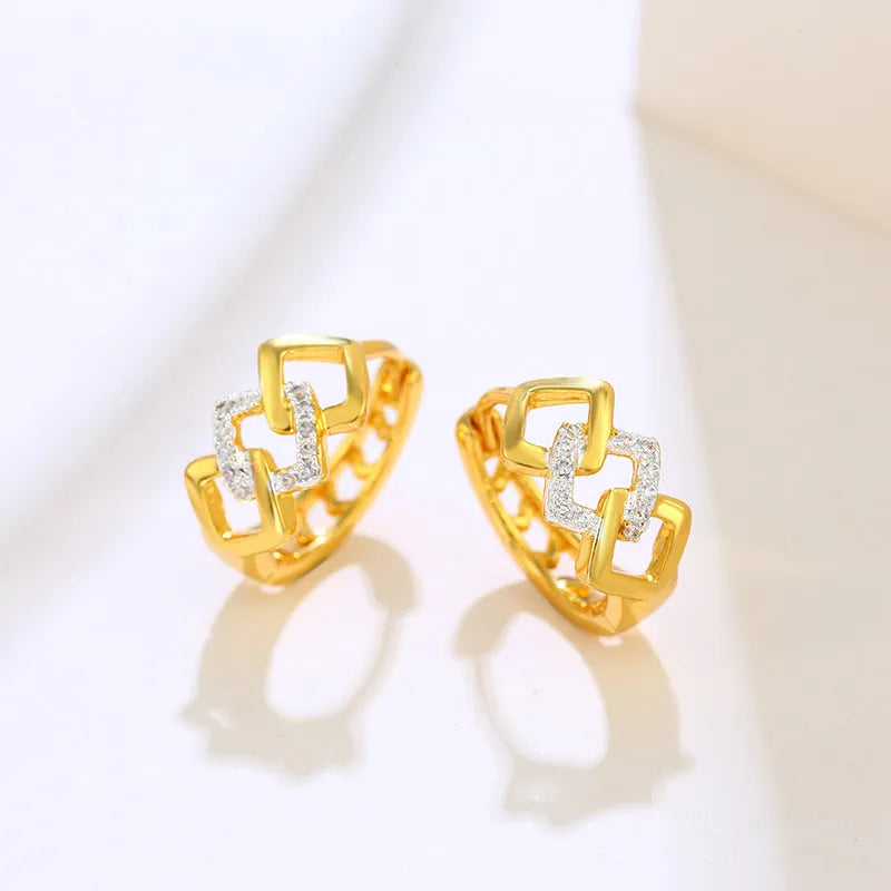Geometric hollow-out earrings with gold electroplating and ear clip fastening