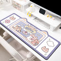 Oversized natural rubber desk pad mouse mat in Pink Bunny design showing 50x100cm size on office desk