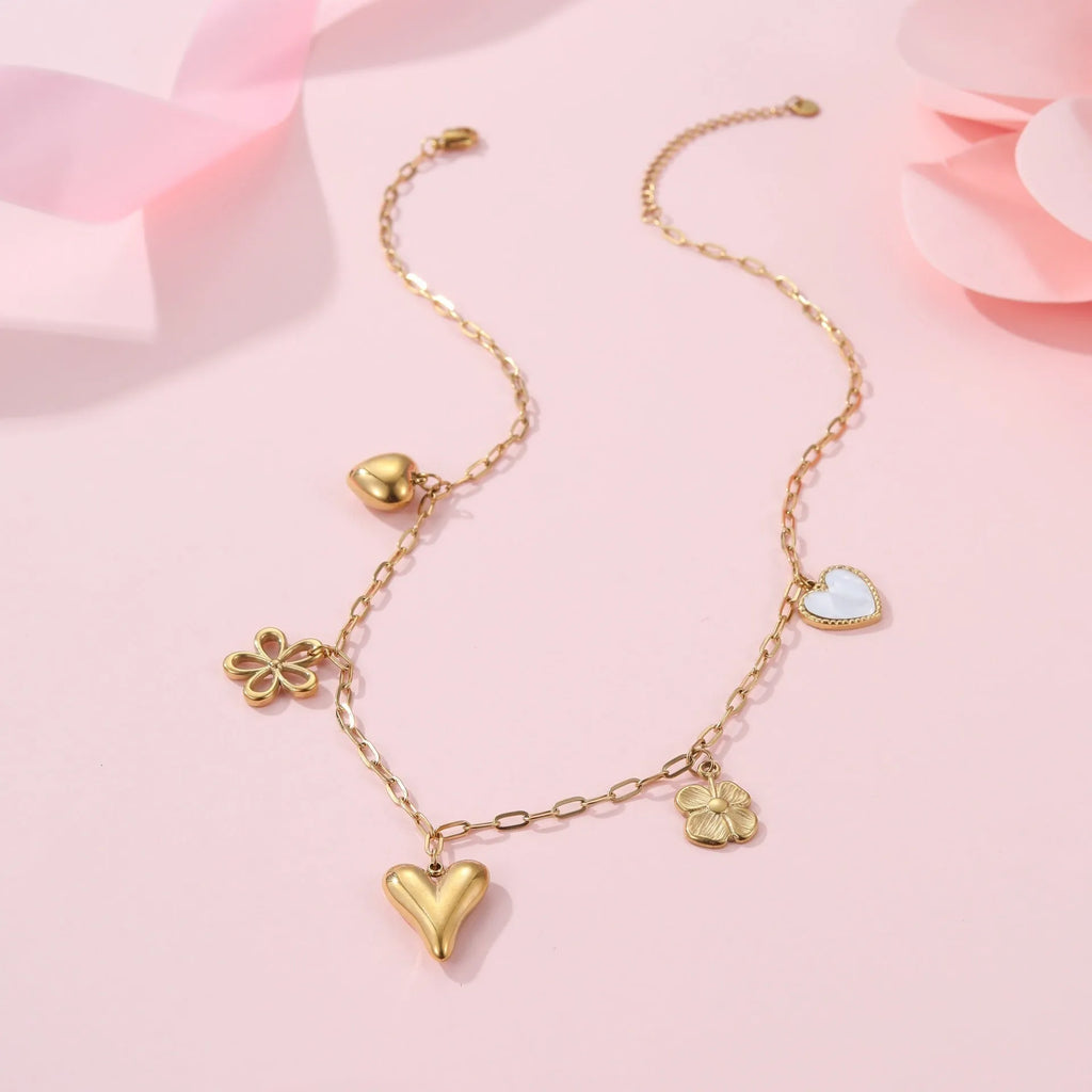 Stainless steel women's necklace with sun pendant on adjustable chain