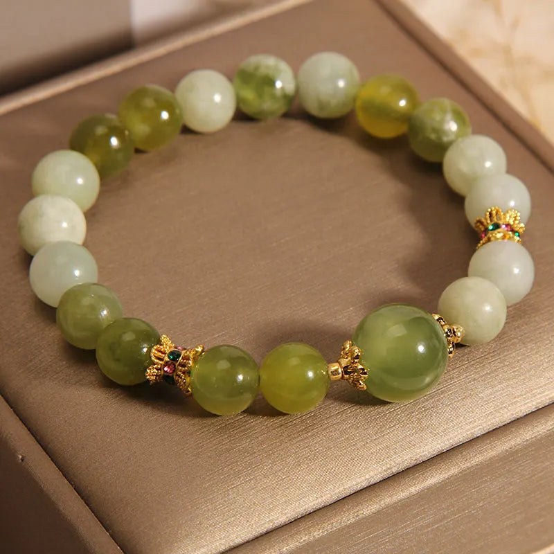 Women's original design jade bracelet in Xiuyan green colour with mori style aesthetic