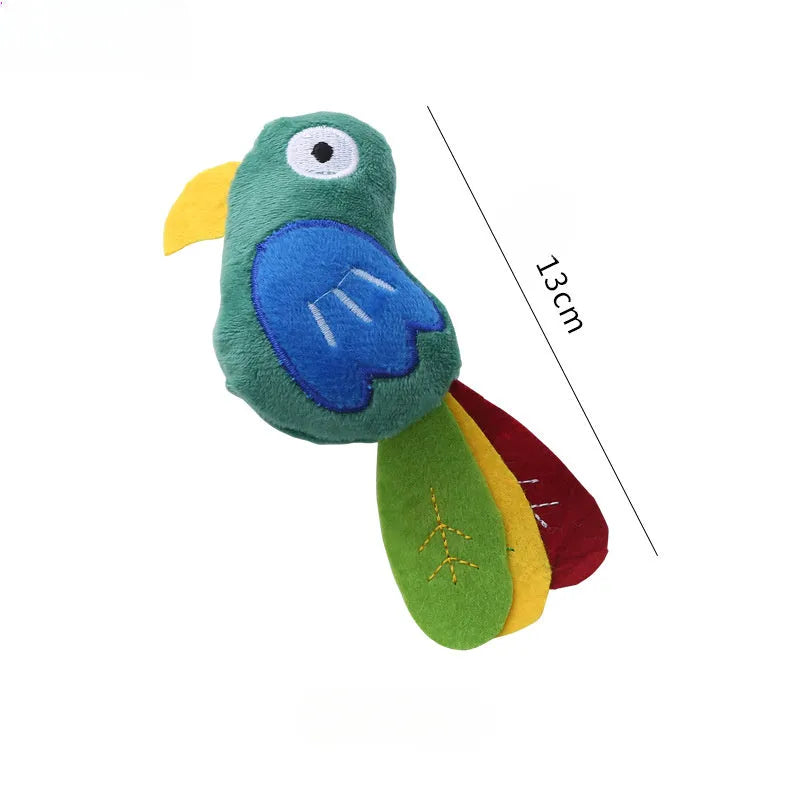 Plush cat toy shaped like a cow, crocodile, or parrot on a plain background.