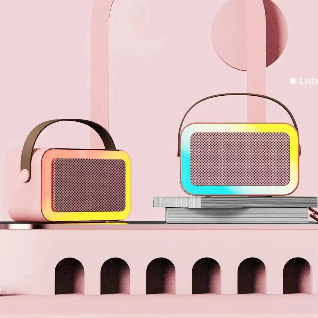 Portable Bluetooth karaoke microphone speaker with coloured LED lights in pink, sky blue or white