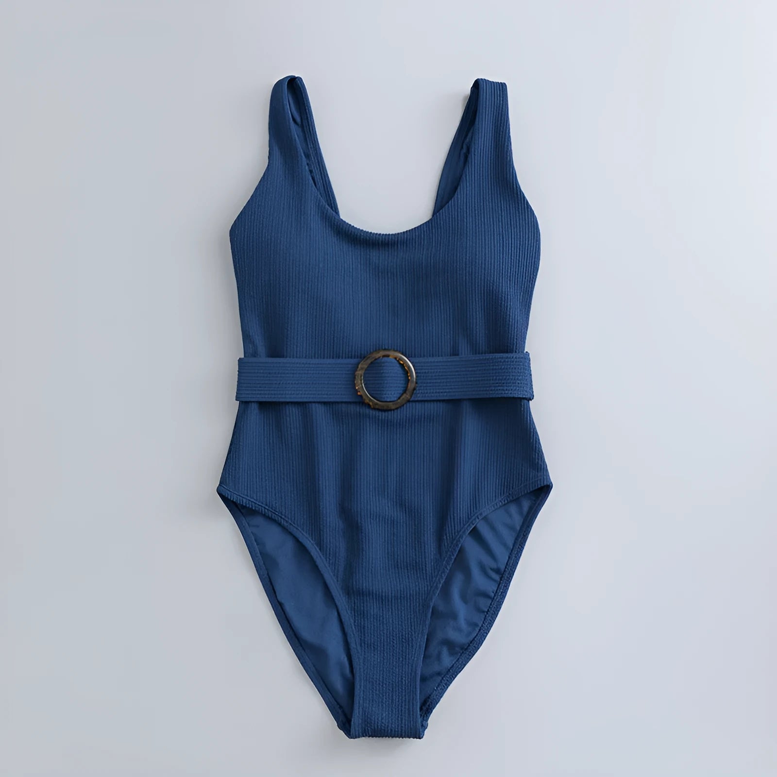 Navy blue women's one-piece triangle swimsuit on a hanger.