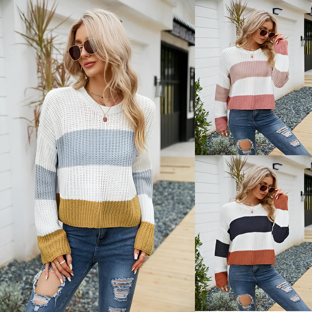 Women's short loose striped pullover sweater in acrylic fabric on a hanger