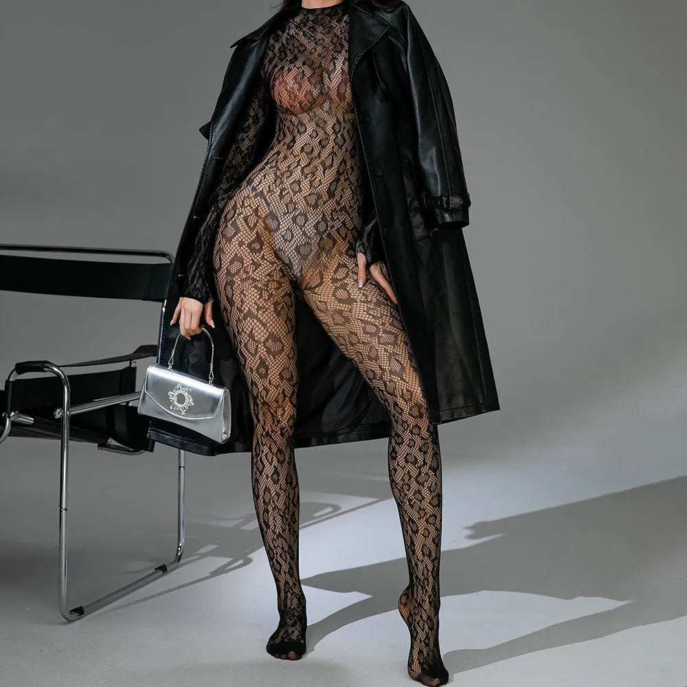 Backless one-piece lingerie with long sleeves in jacquard fishnet fabric on a model.