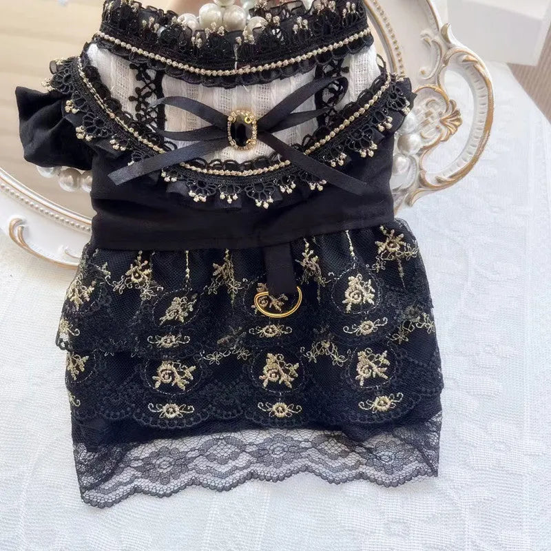 Golden gothic princess style skirt dress for a small dog or cat on a mannequin.