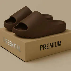 Women's thick sole beach slippers in black, green, and brown colours on a plain background
