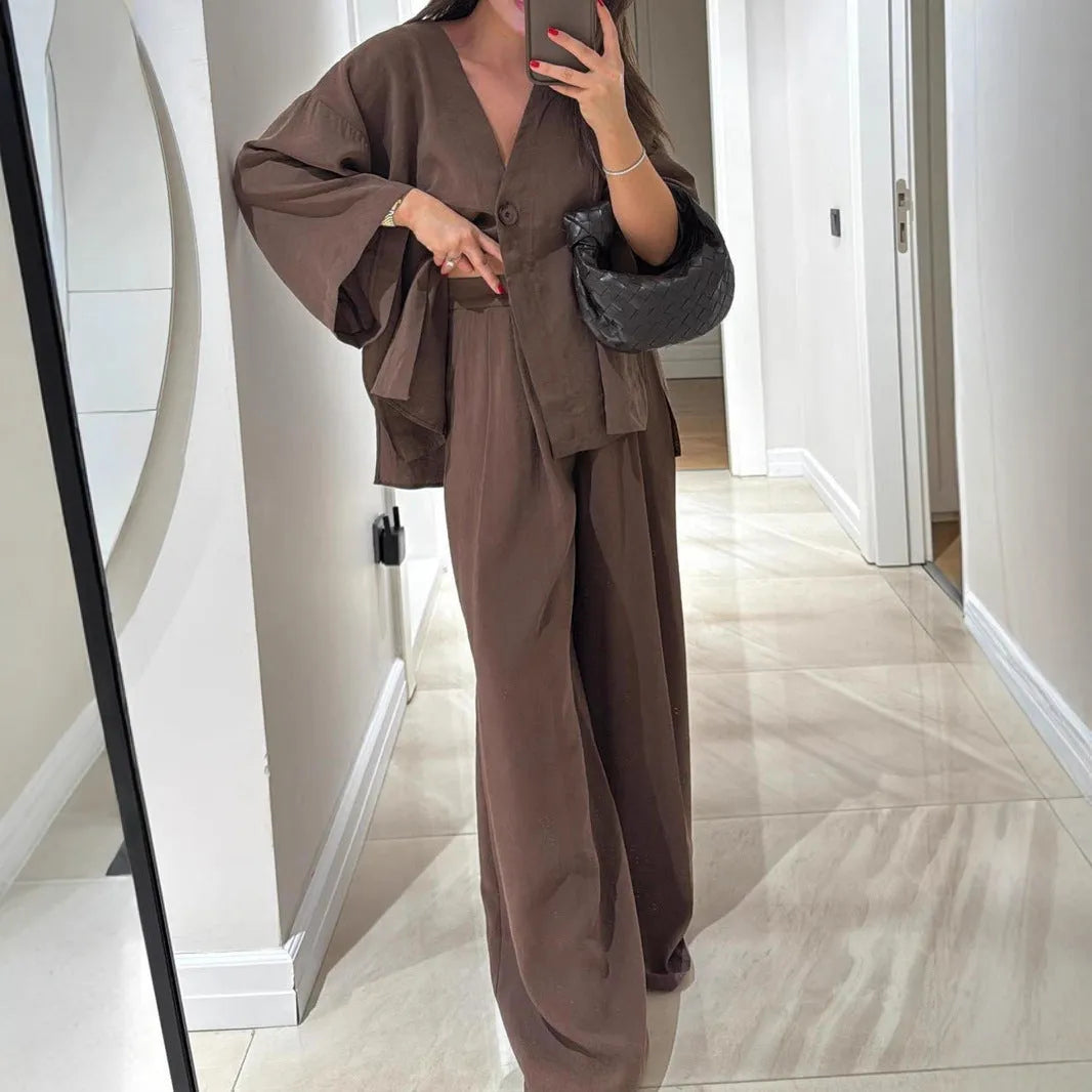 Women's solid colour two-piece set with long sleeve cardigan top and matching trousers, zip and button front, sizes S to XXL