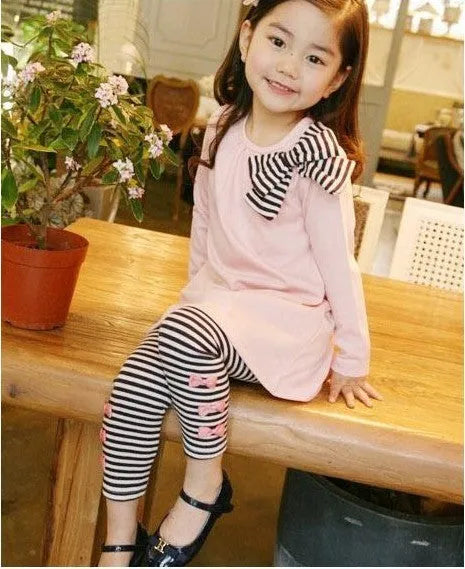Girls pink cotton two-piece clothing set showing matching coordinated outfit