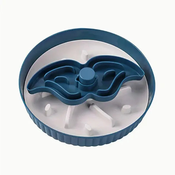 Plastic pet bowl with a central silicone slow feeder mat in a windmill pattern, shown in blue.