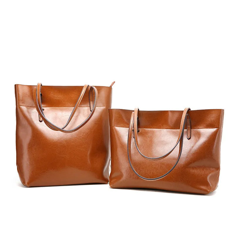 Waxed cowhide leather handbag in cross-section style showing internal compartments and available colour options.