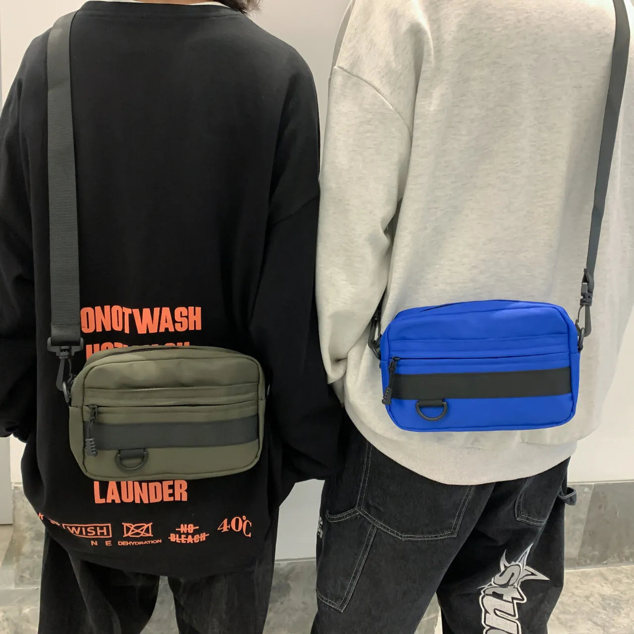 Men's nylon messenger bag in street fashion style with crossbody strap and sewing thread detailing