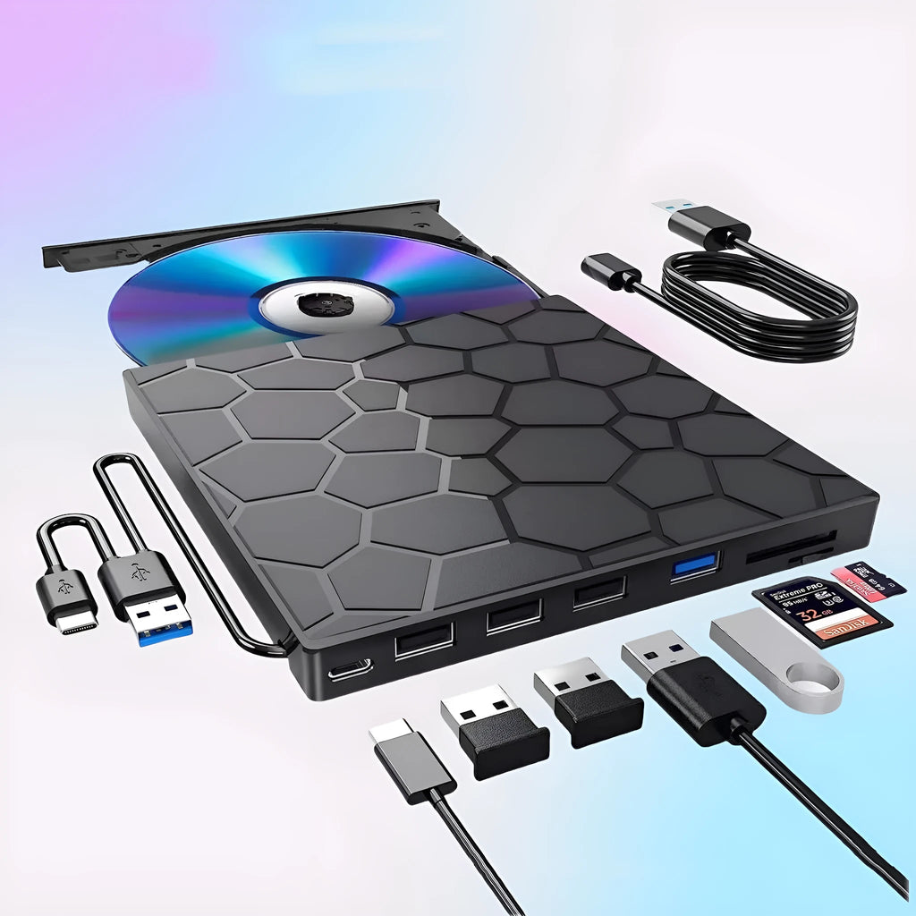Black aluminium external USB CD drive and writer on a desk next to a laptop.