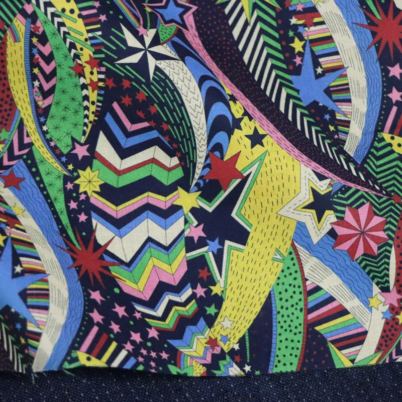 Blue cotton fabric with plant and flower designs, 145cm width measurement