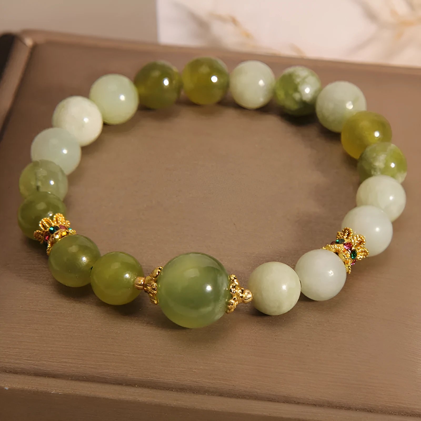 Women's original design jade bracelet in Xiuyan green colour with mori style aesthetic