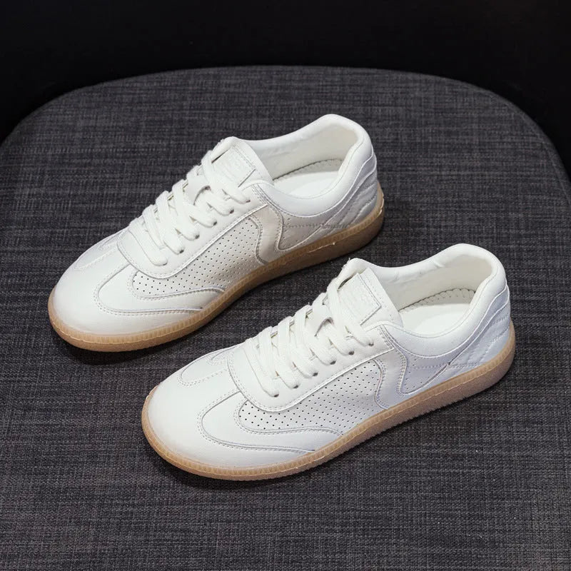 Breathable hollow casual shoes in white with cowhide upper, flat heel, and round toe