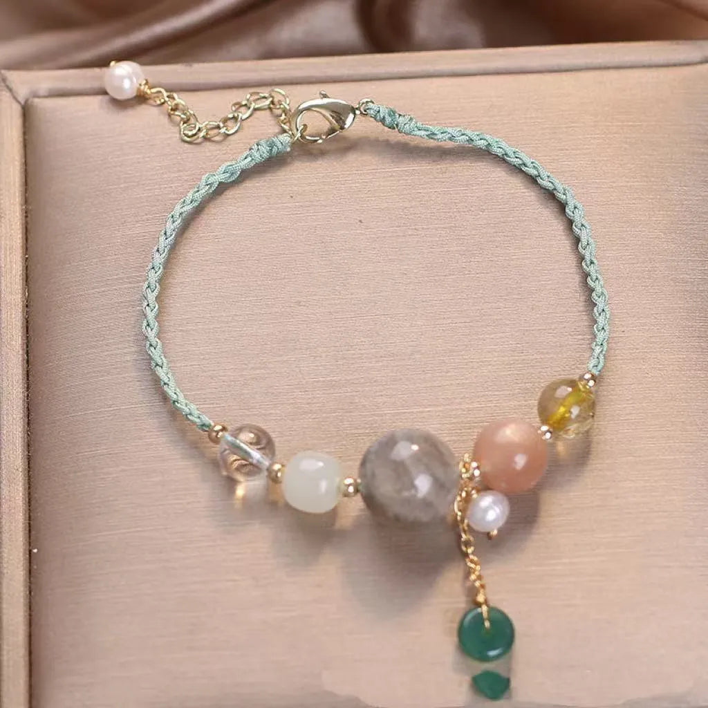 Hand-woven women's bracelet with peace buckle design in crystal material with sequin detailing
