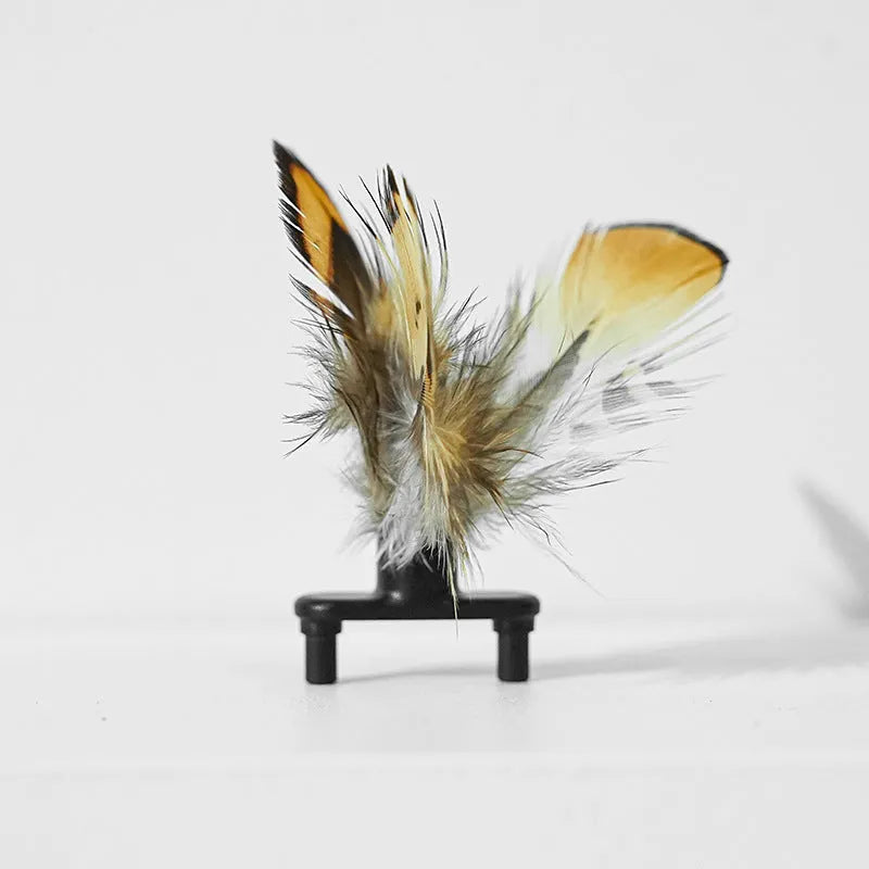 Pink electric cat toy with moving stick and feather teaser for kittens