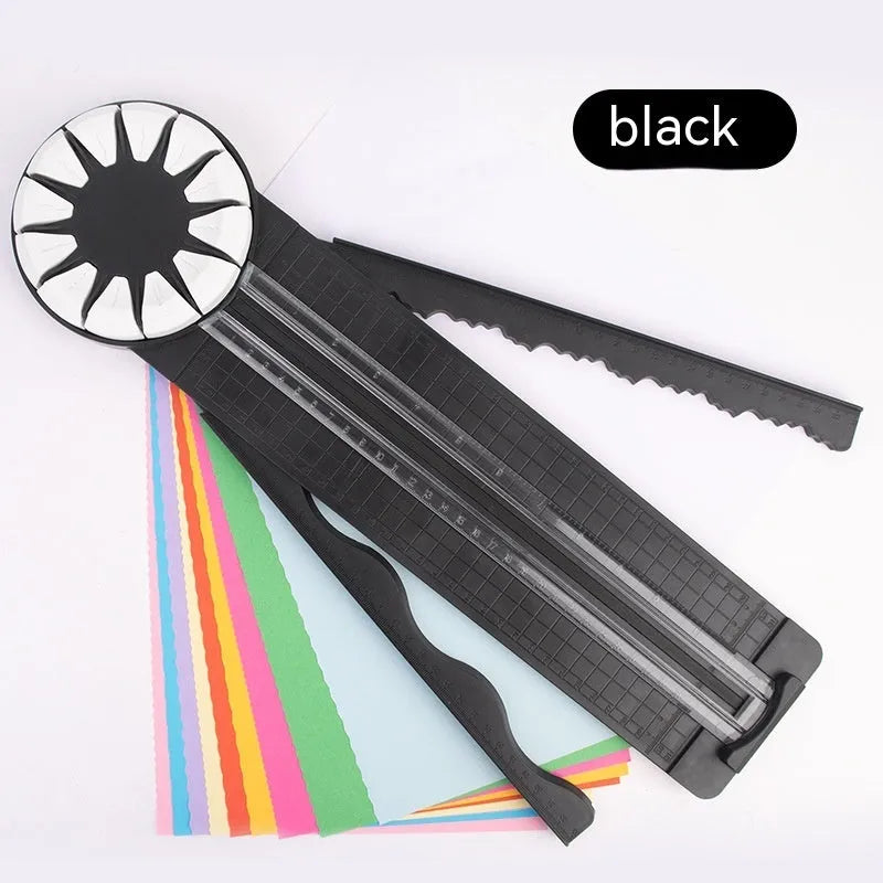 12-in-1 plastic paper cutting machine with dotted board in pink or black, measuring 46.2 cm long