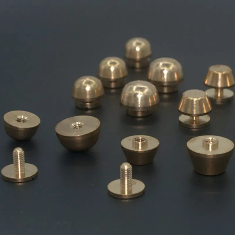 Brass decorative belt buckle showing round and bucket foot nail shapes in 10x6mm and 12x7mm sizes.