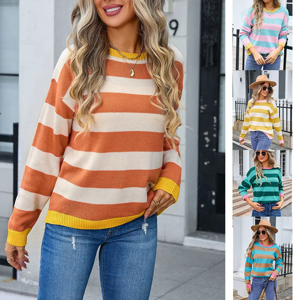 Woman wearing a loose blue and white striped acrylic sweater with long sleeves and a round neck.