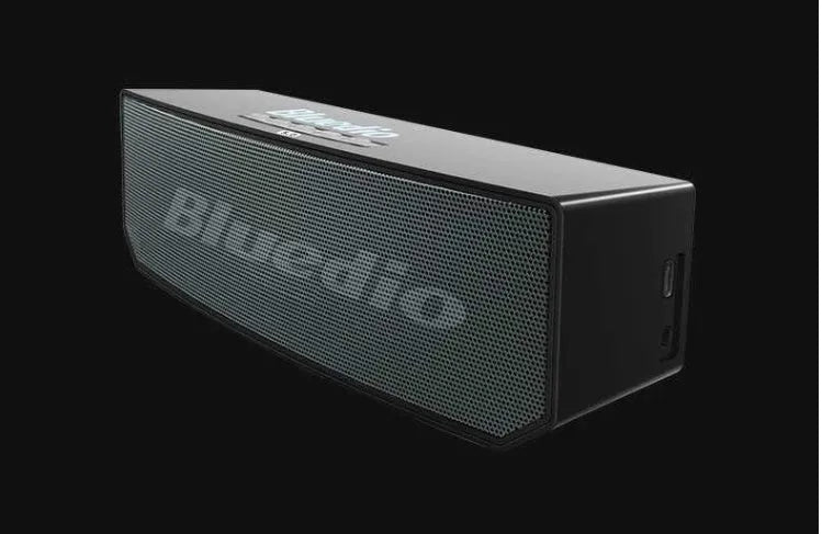 Black BS-6 Cloud Smart Speaker showing front grille and compact rectangular design