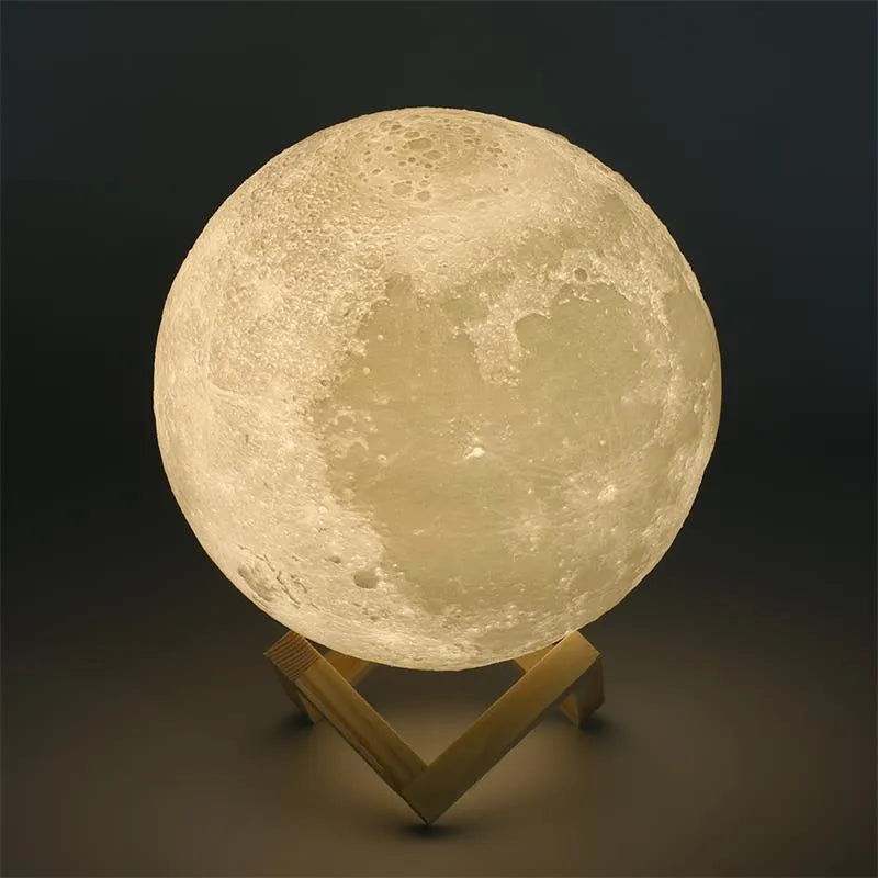3D printed white moon lamp on a wooden stand with touch control ring at base