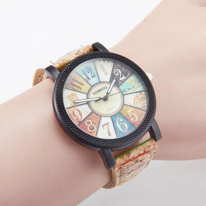 Women's leather strap quartz watch with 37mm round dial and stainless steel buckle