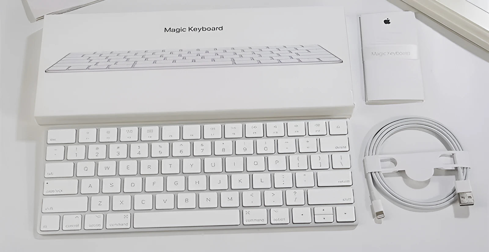 White Apple G6 Bluetooth wireless keyboard with ultra-thin metal construction and multimedia keys