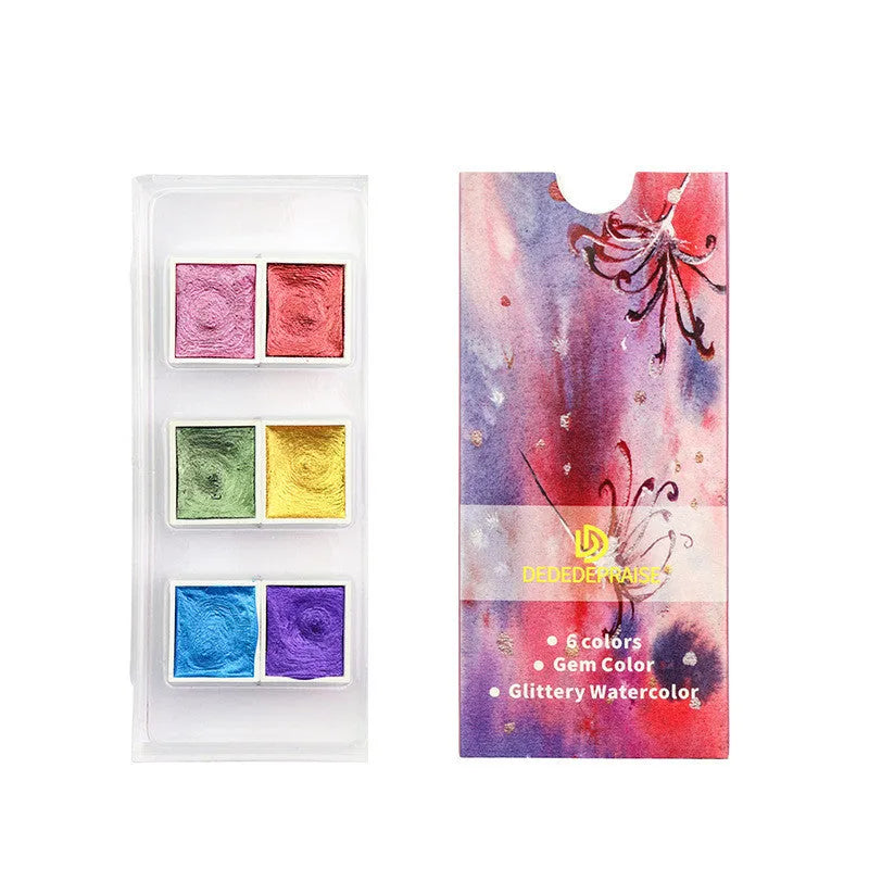 Solid watercolour pigment set showing pearlescent colour blocks in organised box
