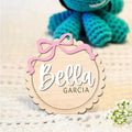 Square wooden baby room decoration ornament with a personalised name engraved in the centre.