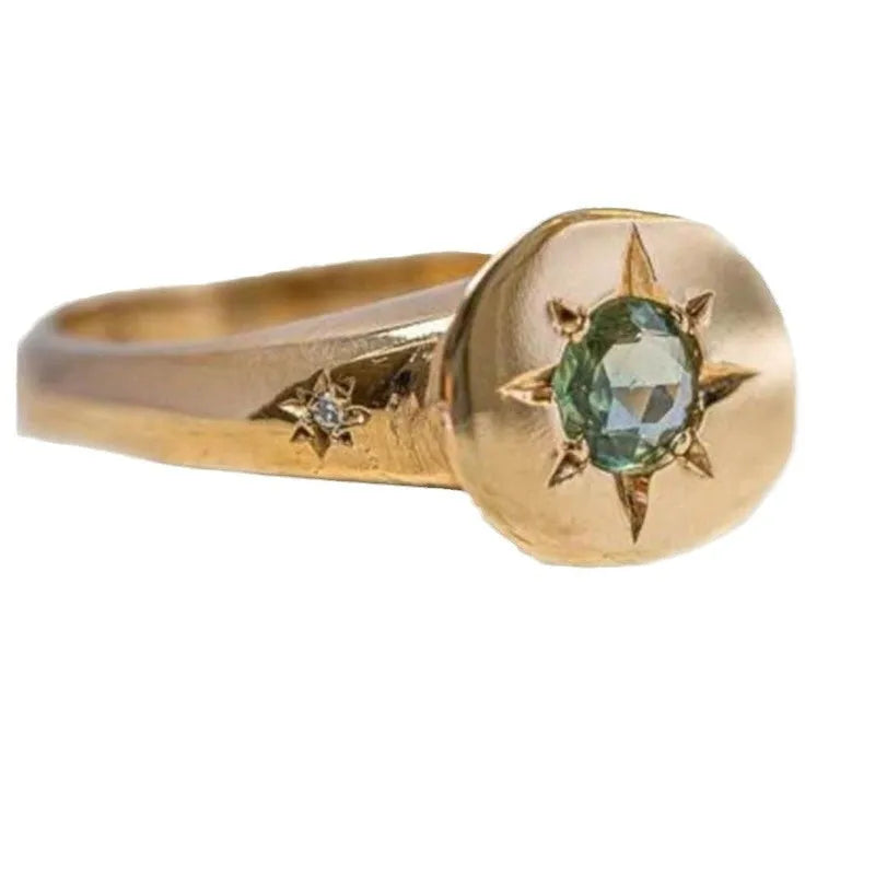Golden adjustable ring with oval asterism zircon design and star-shaped micro inlay pattern