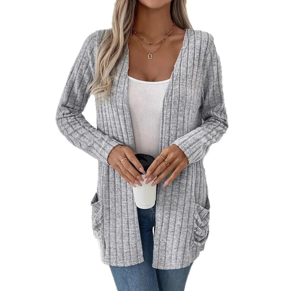Plus size loose fit cardigan with long sleeves and pockets in black or granny grey colour