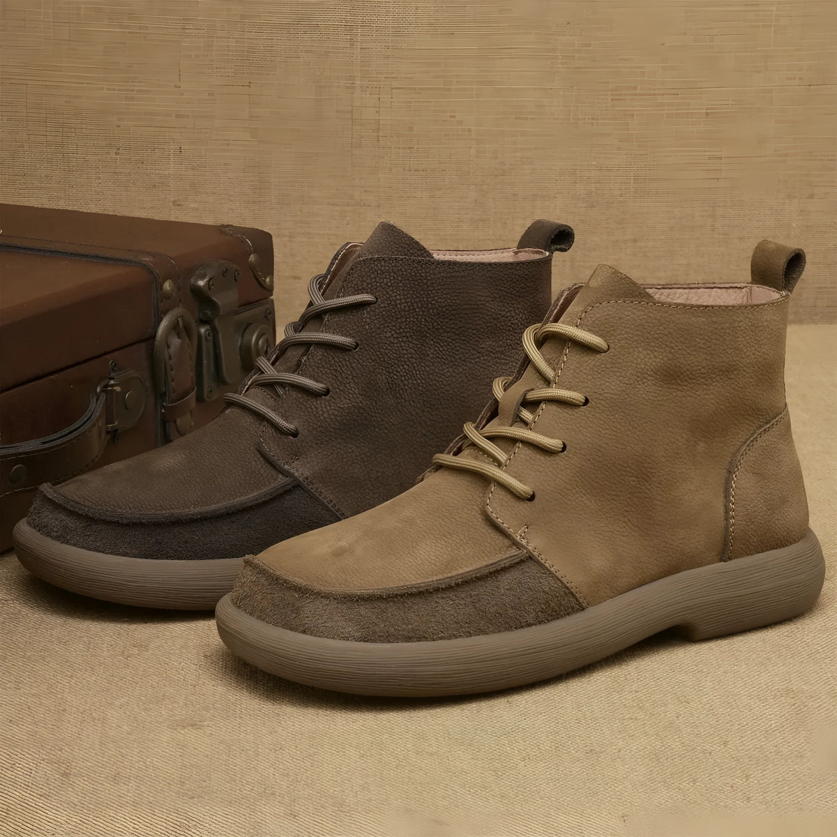 Genuine leather British-style Martin boots with wedge heel in frost-grey colour showing lace-up design and mid-calf length