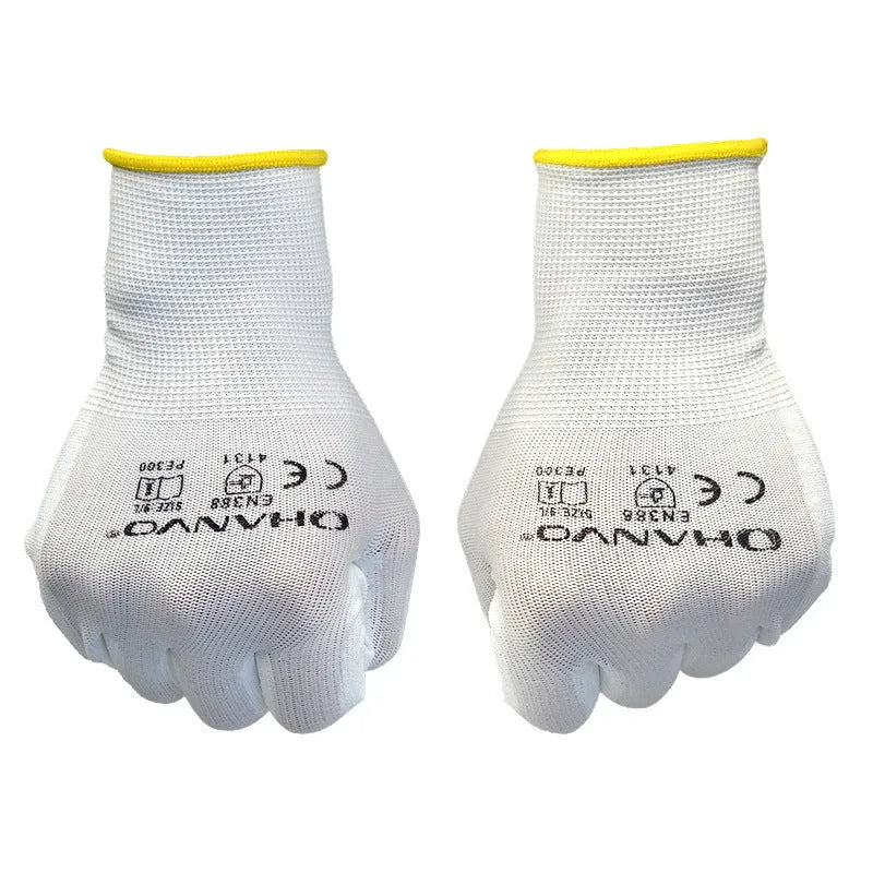White PU-coated work gloves showing flexible fit and 24 cm length on a workbench.