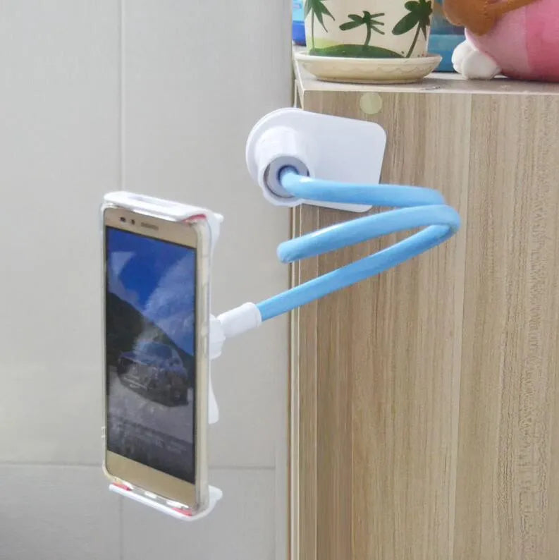 Black bedside oversize flat panel handset phone holder with long adjustable arm mounted on a table