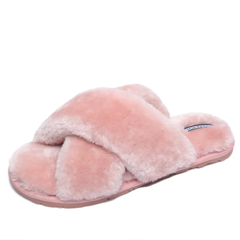 Cross open-toe fur slippers in various colours on a patterned non-slip sole.