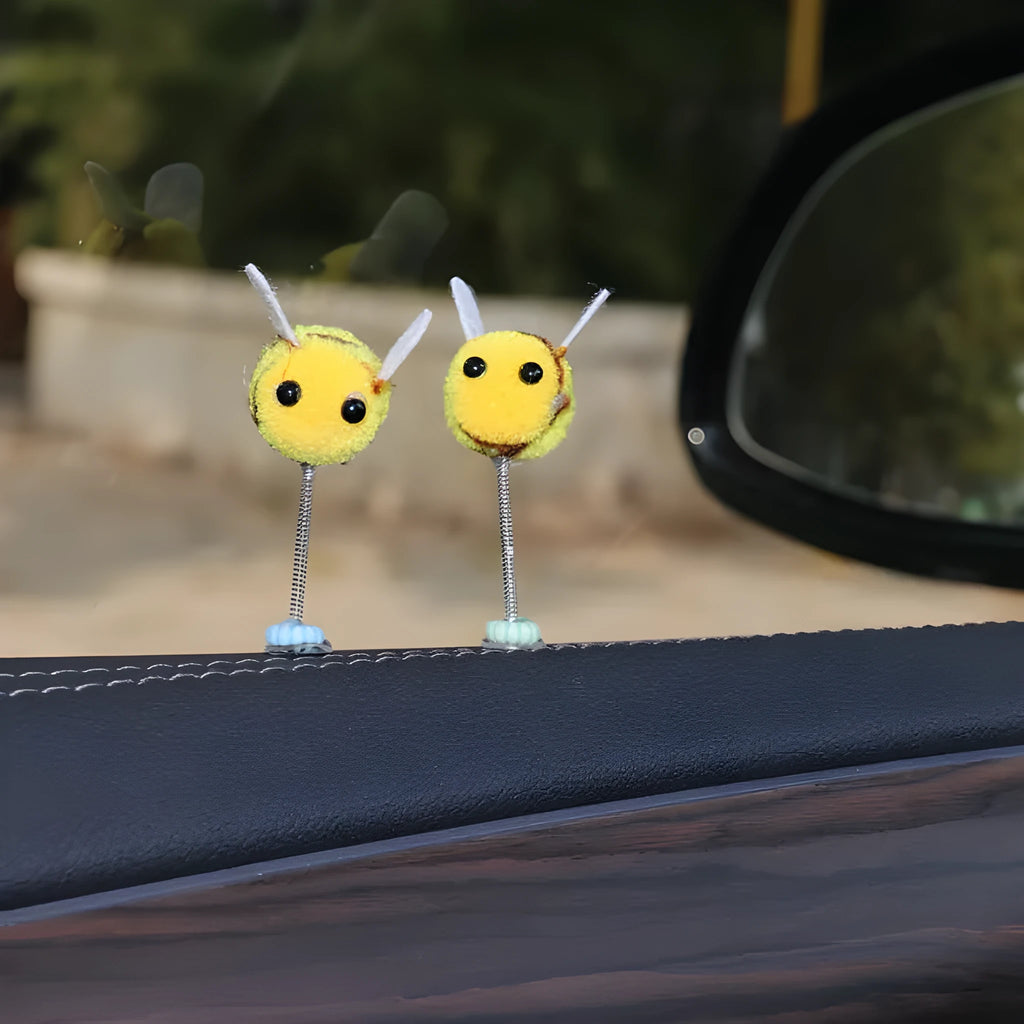 Small furry brown and yellow cartoon bee car decoration ornament measuring 3cm