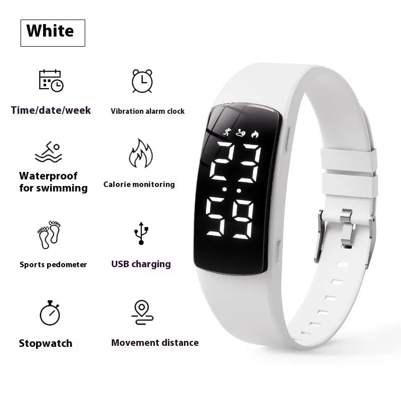 Vibration alarm clock smartwatch with a coloured silicone strap on a wrist, showing its LED display.